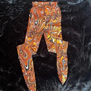 Orange and black swirl mesh leggings